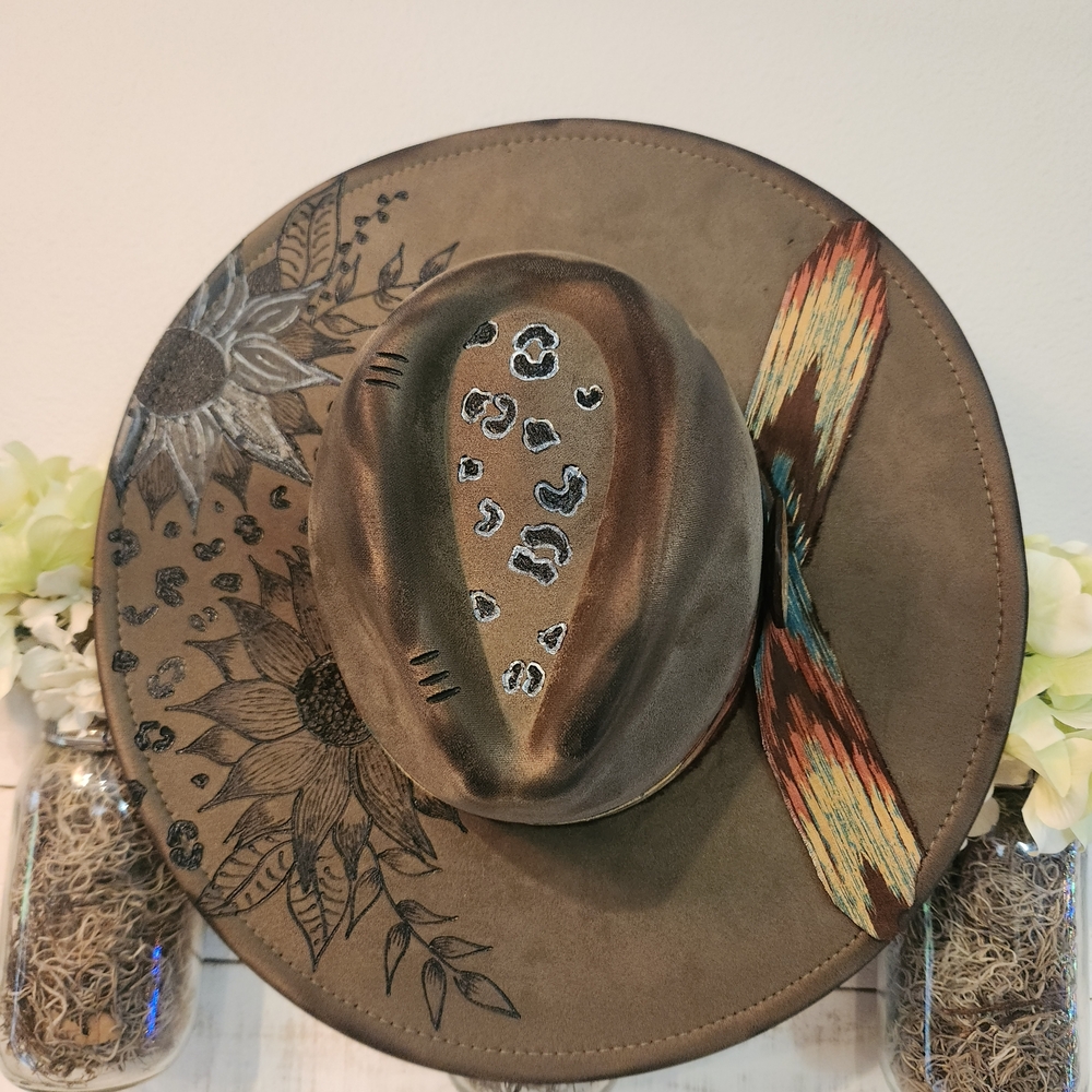Stylish Dark Green Hat with Artistic Design